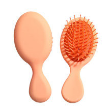 Wholesale Light Pink Mini Oval Paddle Hair Brushes Wet Hair Dry Hair